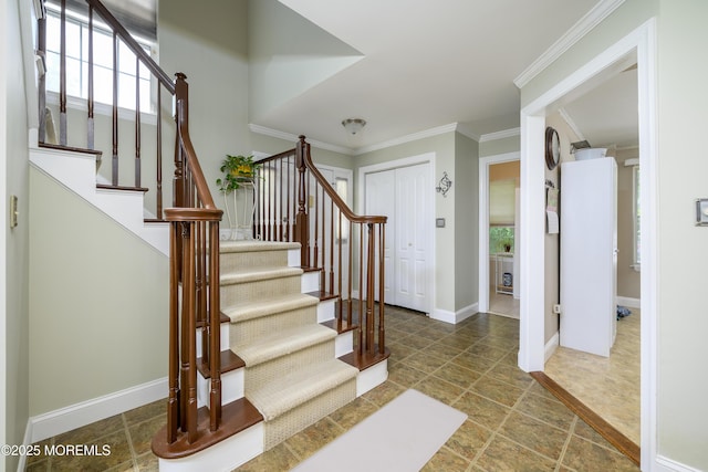 45 Liverpool Ct Unit 10, Freehold, NJ 07728 - foyer with crown molding and stairs