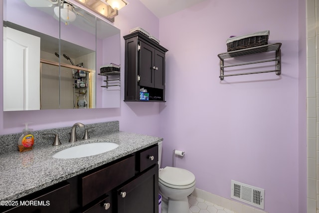 45 Liverpool Ct Unit 10, Freehold, NJ 07728 - bathroom featuring a shower stall, vanity, tile patterned floors, and a ceiling fan
