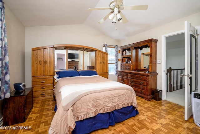 45 Liverpool Ct Unit 10, Freehold, NJ 07728 - bedroom with lofted ceiling, arched walkways, and a ceiling fan