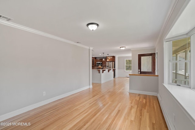 6 Frances Ct, Red Bank, NJ 07701 - unfurnished living room featuring ornamental molding, light wood-style flooring, and baseboard heating
