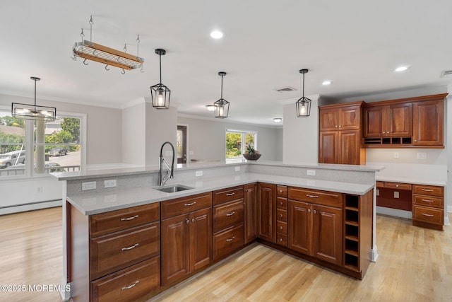 6 Frances Ct, Red Bank, NJ 07701 - kitchen with light wood-type flooring, crown molding, a baseboard heating unit, recessed lighting, and hanging light fixtures