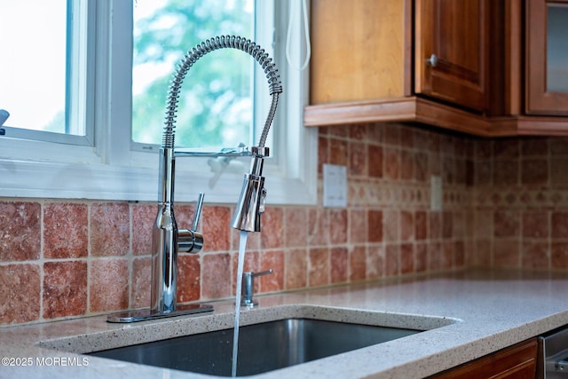 6 Frances Ct, Red Bank, NJ 07701 - kitchen view of backsplash, light stone counters, and dishwashing machine