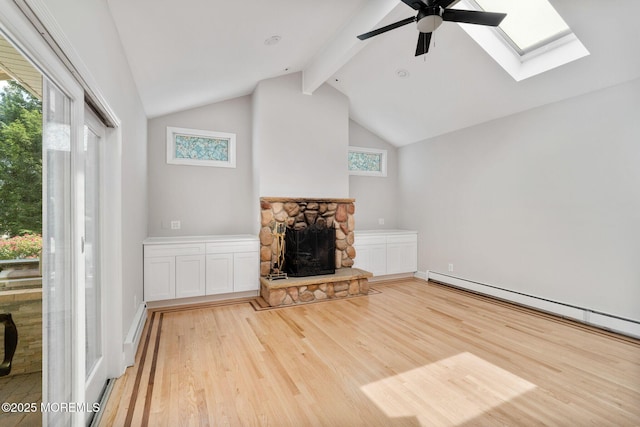 6 Frances Ct, Red Bank, NJ 07701 - unfurnished living room with light wood-type flooring, beam ceiling, a ceiling fan, a fireplace, and a skylight