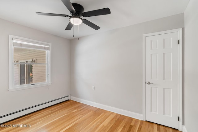 6 Frances Ct, Red Bank, NJ 07701 - unfurnished room with baseboard heating, light wood finished floors, and a ceiling fan