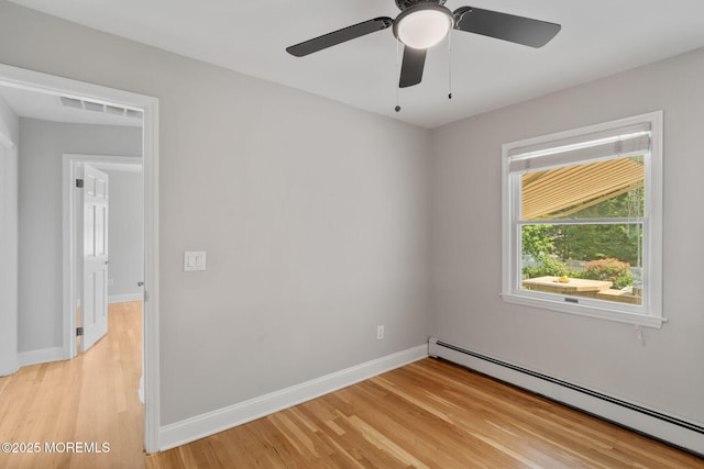 6 Frances Ct, Red Bank, NJ 07701 - spare room featuring a baseboard heating unit, light wood-type flooring, and ceiling fan