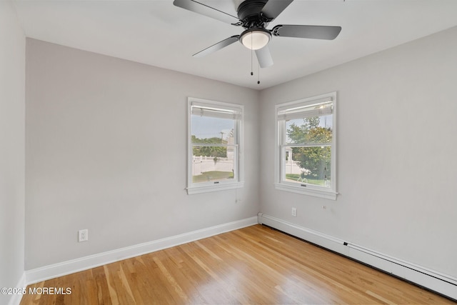 6 Frances Ct, Red Bank, NJ 07701 - unfurnished room with a baseboard heating unit, light wood-style flooring, and ceiling fan