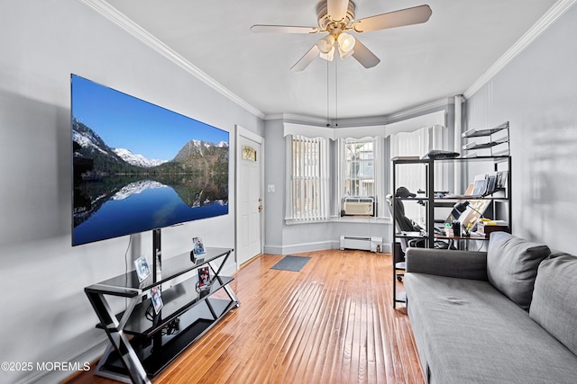 612 Grier Ave, Elizabeth, NJ 07202 - living area featuring a baseboard radiator, ornamental molding, ceiling fan, hardwood / wood-style floors, and cooling unit