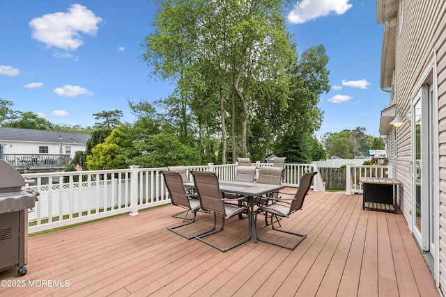 15 Bronia St, Howell, NJ 07731 - deck with outdoor dining space, area for grilling, and view of wooded area