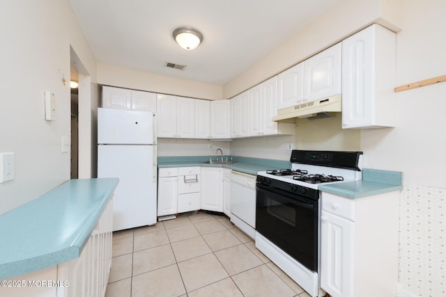 7 Kathy Ct Unit 6204, Brick, NJ 08724 - kitchen featuring white appliances, under cabinet range hood, white cabinetry, light countertops, and light tile patterned floors