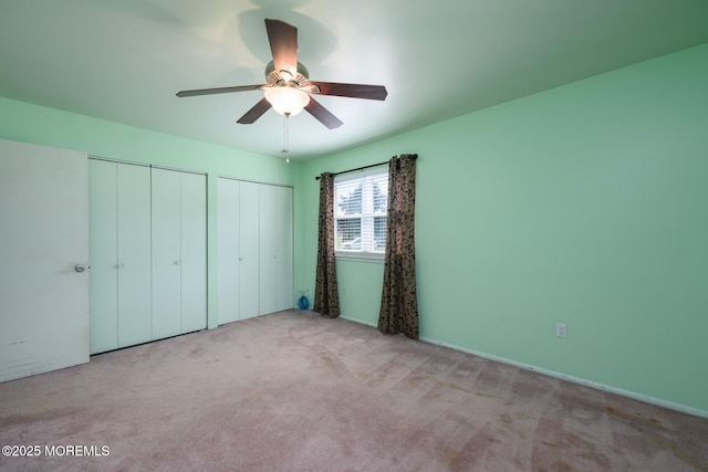 7 Kathy Ct Unit 6204, Brick, NJ 08724 - unfurnished bedroom with two closets, carpet floors, and a ceiling fan