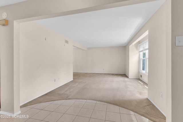 1 Denise Ct, Tinton Falls, NJ 07753 - empty room with light carpet and light tile patterned floors