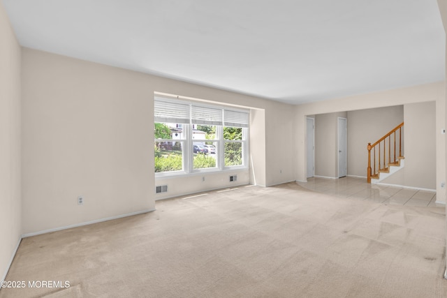 1 Denise Ct, Tinton Falls, NJ 07753 - carpeted spare room featuring stairs and baseboards