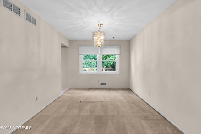 1 Denise Ct, Tinton Falls, NJ 07753 - carpeted spare room with a chandelier and baseboards