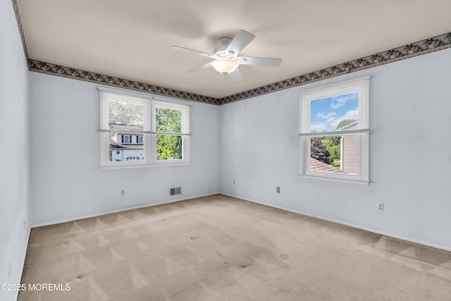 1 Denise Ct, Tinton Falls, NJ 07753 - spare room featuring carpet and a ceiling fan