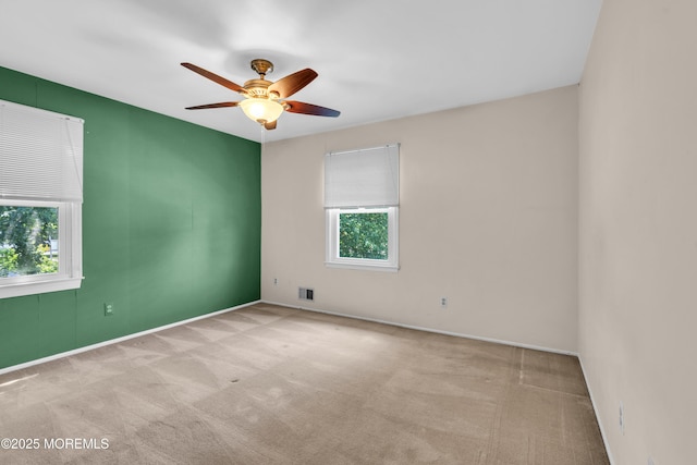 1 Denise Ct, Tinton Falls, NJ 07753 - carpeted spare room featuring plenty of natural light and a ceiling fan