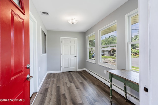 7 Bear Mountain Ct, Toms River, NJ 08753 - entrance foyer featuring a baseboard radiator and dark wood-style floors