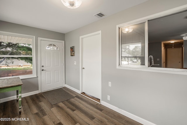 7 Bear Mountain Ct, Toms River, NJ 08753 - entrance foyer featuring dark wood-style flooring