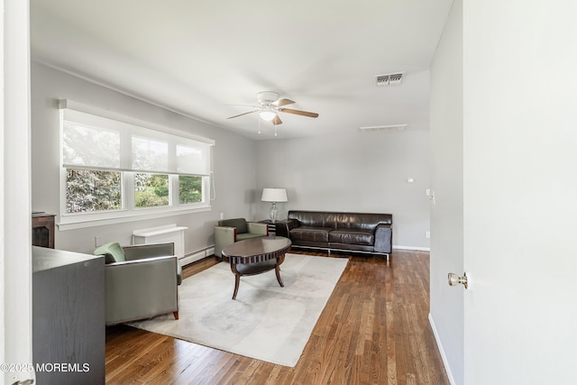 7 Bear Mountain Ct, Toms River, NJ 08753 - living area with ceiling fan, wood finished floors, and baseboard heating