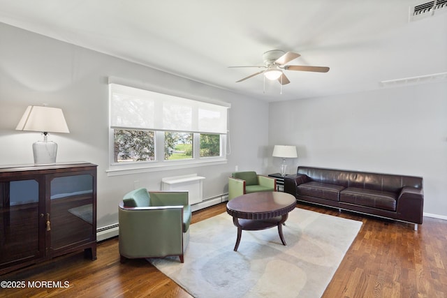 7 Bear Mountain Ct, Toms River, NJ 08753 - living area with a baseboard radiator, a ceiling fan, and wood finished floors