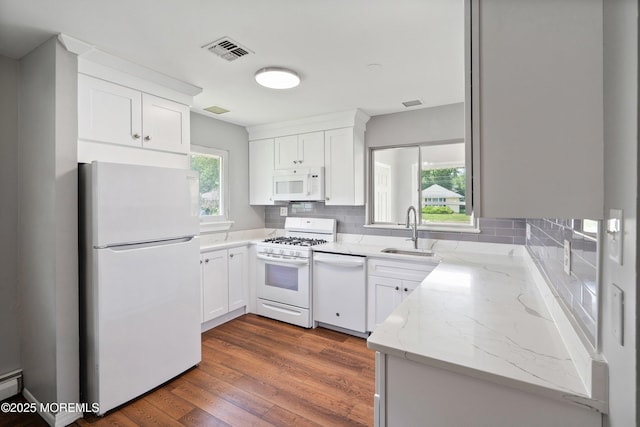 7 Bear Mountain Ct, Toms River, NJ 08753 - kitchen featuring white appliances, light stone counters, decorative backsplash, and white cabinetry