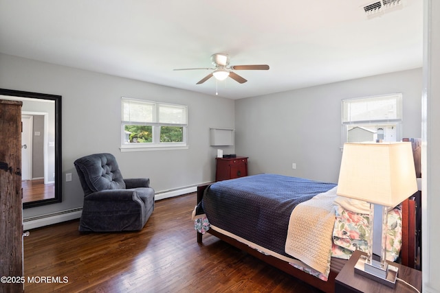 7 Bear Mountain Ct, Toms River, NJ 08753 - bedroom with baseboard heating, wood finished floors, and ceiling fan