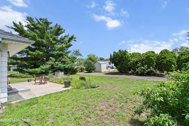 7 Bear Mountain Ct, Toms River, NJ 08753 - view of grassy yard with a storage shed and a patio area