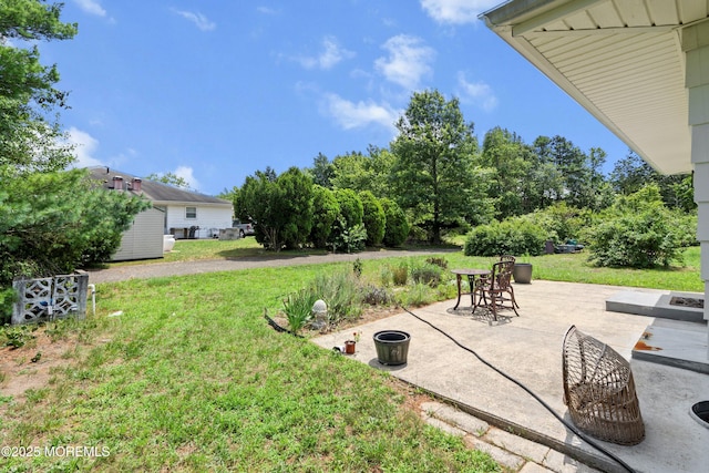 7 Bear Mountain Ct, Toms River, NJ 08753 - view of grassy yard with a patio