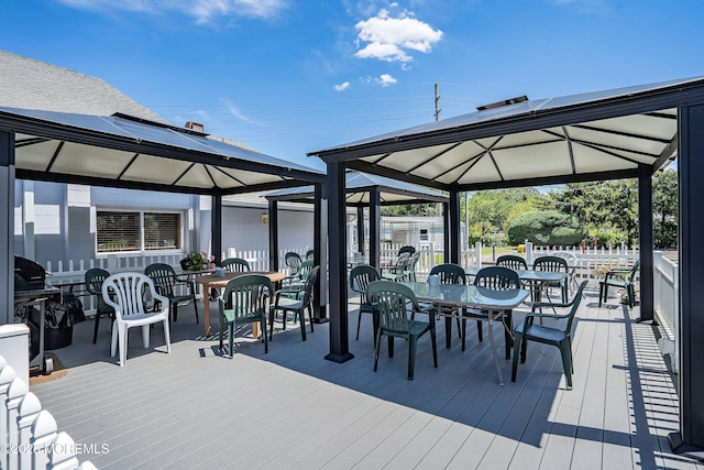 7 Bear Mountain Ct, Toms River, NJ 08753 - wooden deck with a gazebo and outdoor dining space
