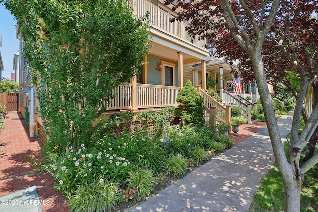 73 Clark Ave, Ocean Grove, NJ 07756 - view of front of home with covered porch and a balcony