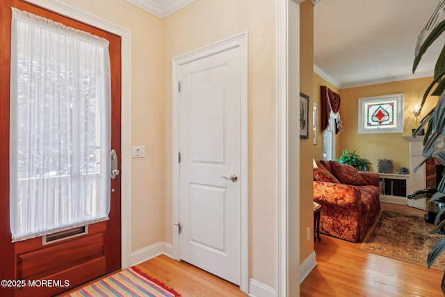 73 Clark Ave, Ocean Grove, NJ 07756 - foyer entrance with light wood-type flooring, ornamental molding, and plenty of natural light