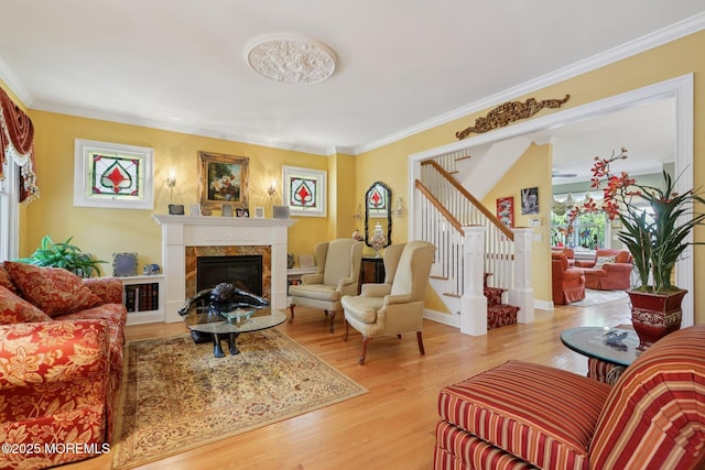 73 Clark Ave, Ocean Grove, NJ 07756 - living room with stairway, a fireplace, wood finished floors, and crown molding