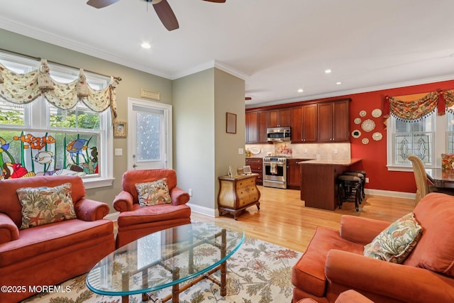 73 Clark Ave, Ocean Grove, NJ 07756 - living room featuring ceiling fan, light wood-type flooring, recessed lighting, and ornamental molding