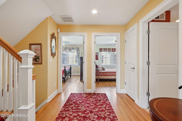 73 Clark Ave, Ocean Grove, NJ 07756 - corridor with light wood-type flooring, stairway, and recessed lighting