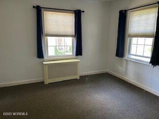 26 Pinckney Rd Unit C, Red Bank, NJ 07701 - unfurnished room with baseboards and radiator heating unit