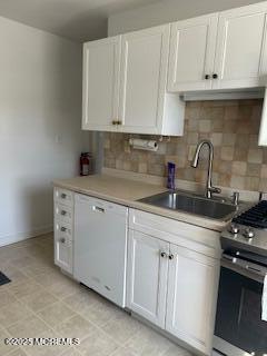 26 Pinckney Rd Unit C, Red Bank, NJ 07701 - kitchen featuring dishwasher, gas stove, white cabinets, and backsplash