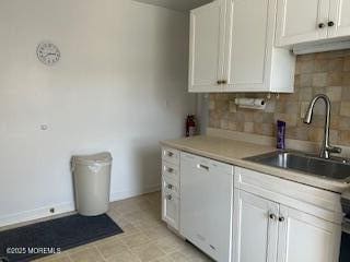 26 Pinckney Rd Unit C, Red Bank, NJ 07701 - kitchen featuring white cabinets, backsplash, and light countertops