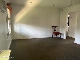 26 Pinckney Rd Unit C, Red Bank, NJ 07701 - unfurnished room with baseboards and dark colored carpet