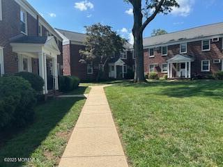 26 Pinckney Rd Unit C, Red Bank, NJ 07701 - view of community featuring a yard
