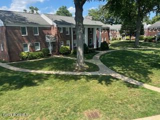 26 Pinckney Rd Unit C, Red Bank, NJ 07701 - view of front of home featuring a front lawn
