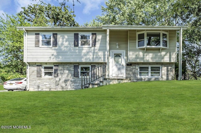 123 Susan Dr, Jackson, NJ 08527 - raised ranch with stone siding and a front yard