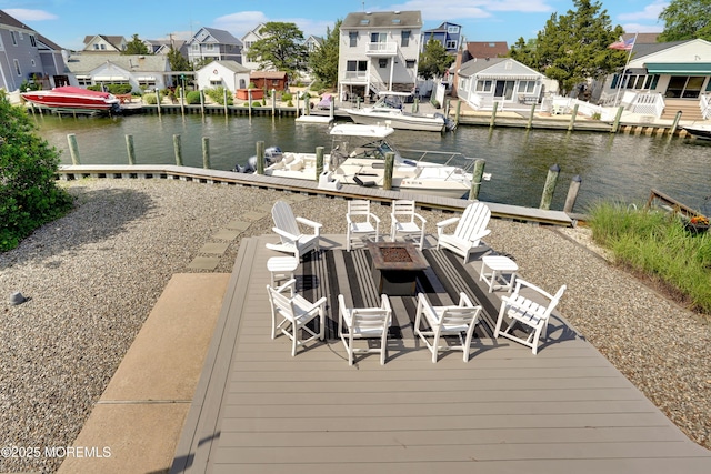 49 Farragut Dr, Brick, NJ 08723 - dock area with a residential view, an outdoor fire pit, and a water view