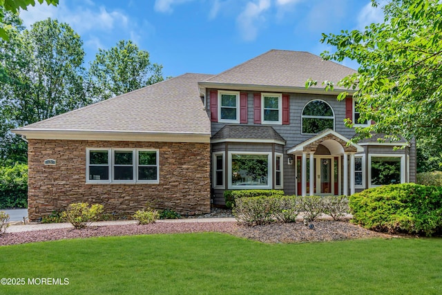 3 Algonquin Ct, Freehold, NJ 07728 - view of front of property with roof with shingles, a front lawn, and stone siding
