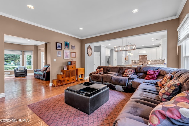 3 Algonquin Ct, Freehold, NJ 07728 - living room featuring recessed lighting, light wood-style flooring, and ornamental molding