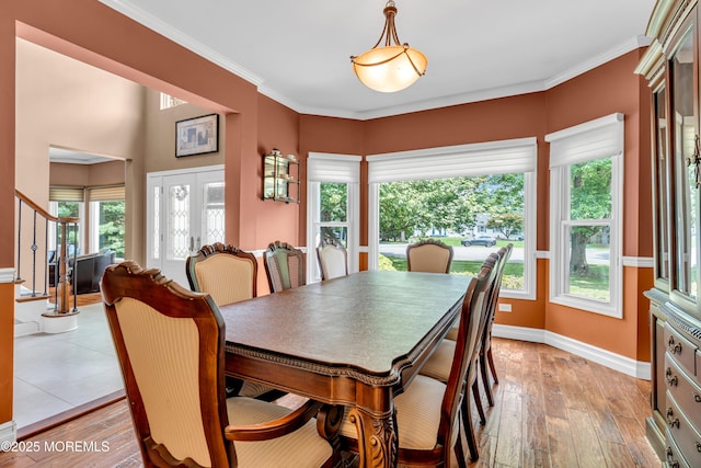 3 Algonquin Ct, Freehold, NJ 07728 - dining space featuring light wood-style floors, stairs, and ornamental molding