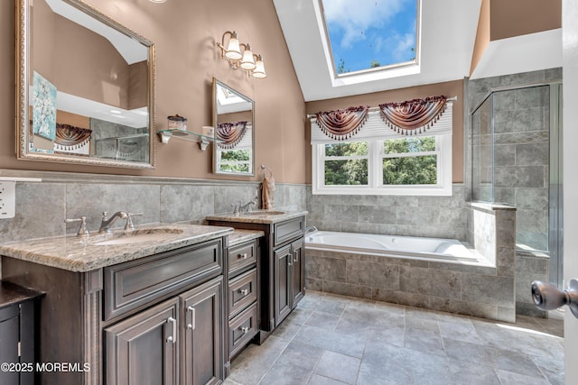 3 Algonquin Ct, Freehold, NJ 07728 - bathroom with vanity, a garden tub, tile walls, tiled shower, and a wainscoted wall