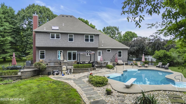 3 Algonquin Ct, Freehold, NJ 07728 - back of house featuring a chimney, a patio, and a shingled roof