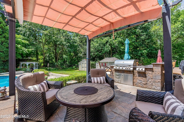 3 Algonquin Ct, Freehold, NJ 07728 - view of patio / terrace featuring exterior kitchen, a storage shed, outdoor lounge area, view of scattered trees, and an outdoor pool