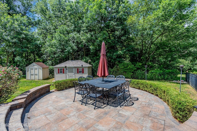 3 Algonquin Ct, Freehold, NJ 07728 - view of patio featuring a storage unit and outdoor dining area
