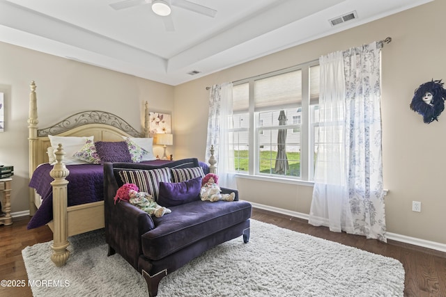 78 Honeysuckle Dr, Manahawkin, NJ 08050 - bedroom featuring wood finished floors, a tray ceiling, and a ceiling fan