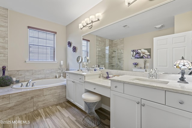 78 Honeysuckle Dr, Manahawkin, NJ 08050 - full bathroom with vanity, a stall shower, a garden tub, and wood finished floors